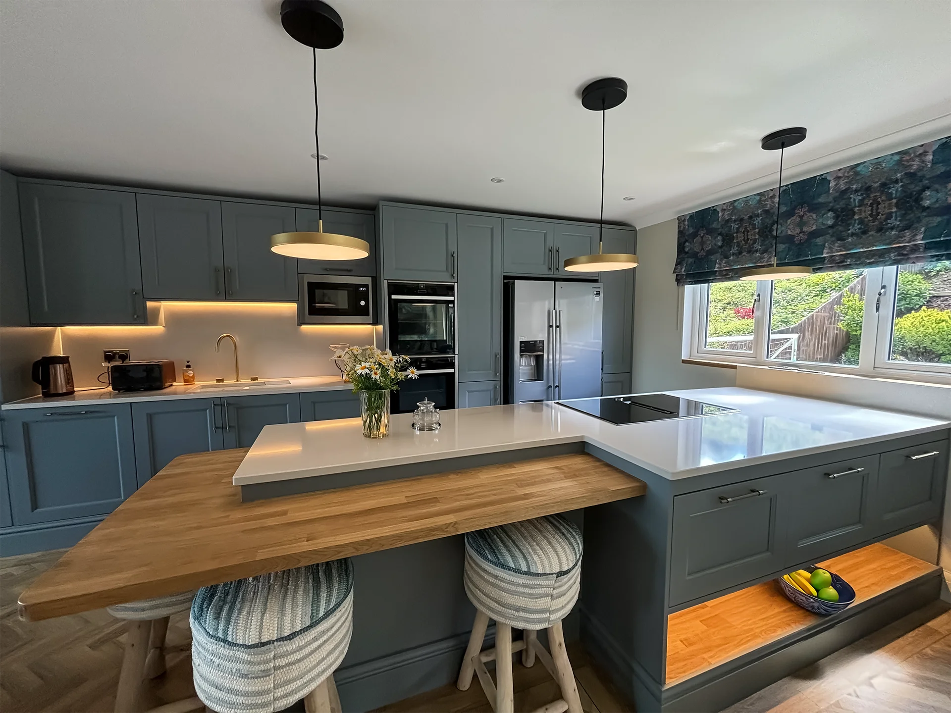 Modern kitchen with island and pendant lights